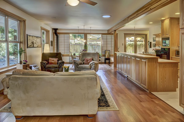 The window shoji on the far wall slide over the decoratively painted wall surface.