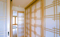 Fixed shoji screen panels line the hallway